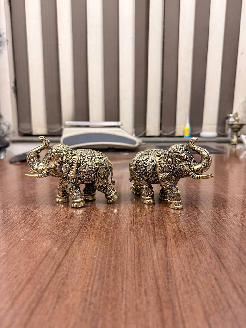 Handcrafted Brass Elephant Pair with Intricate Radha Krishna Raslila Engravings
