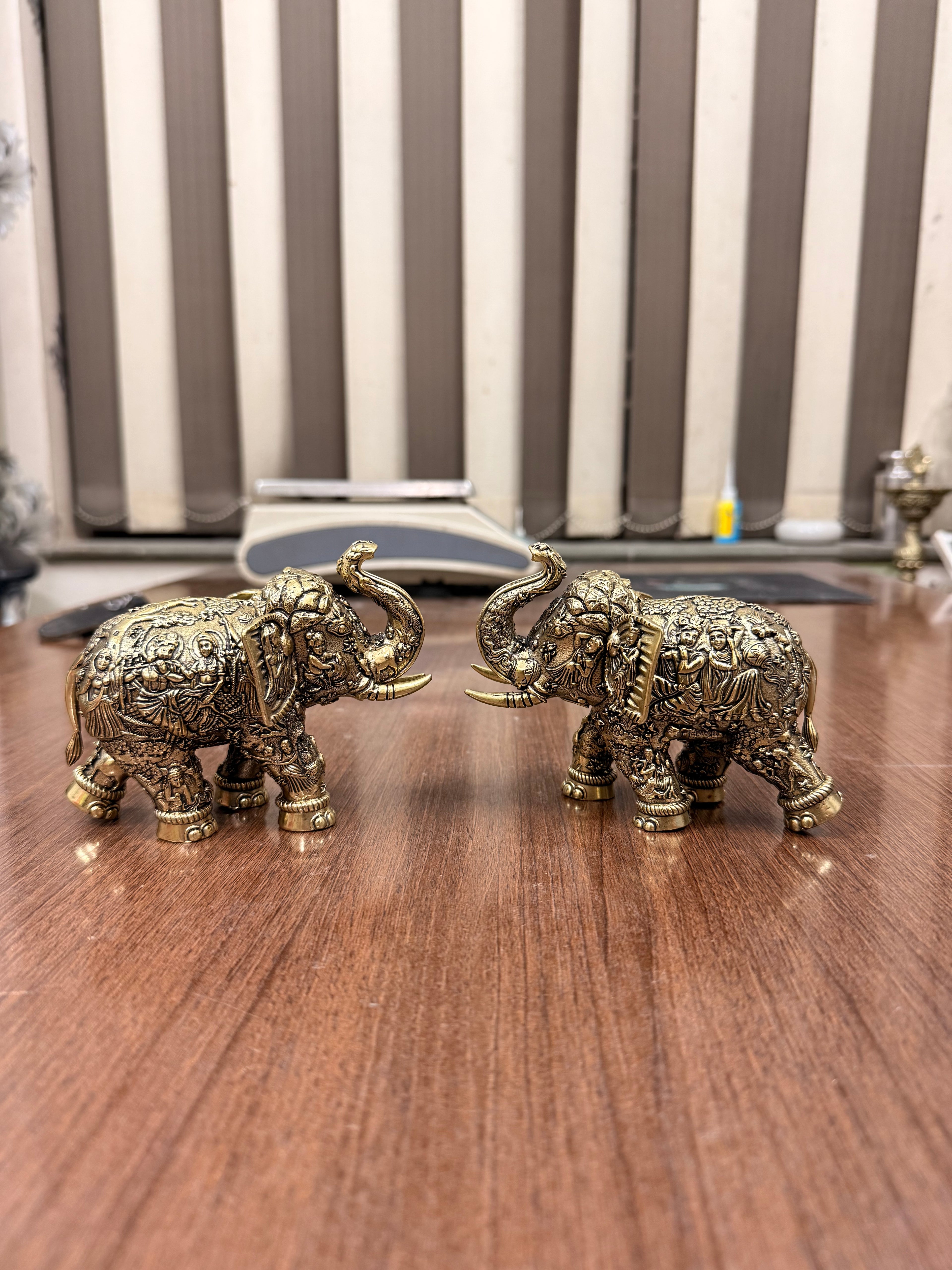 Handcrafted Brass Elephant Pair with Intricate Radha Krishna Raslila Engravings