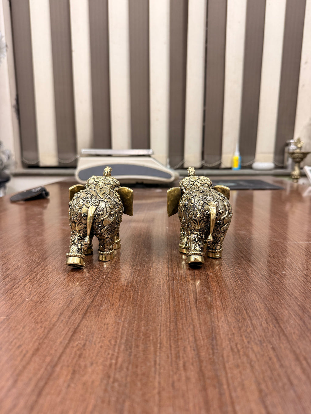 Handcrafted Brass Elephant Pair with Intricate Radha Krishna Raslila Engravings
